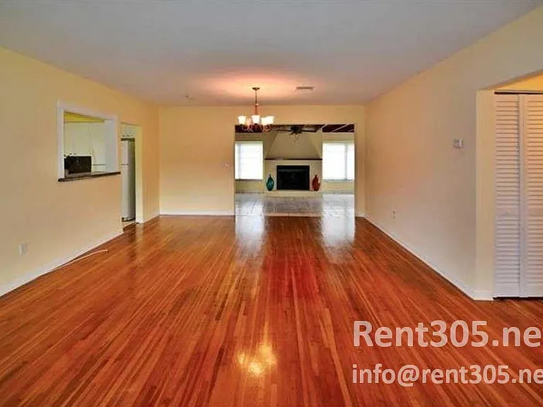 Expansive entry with hardwood floors throughout.
