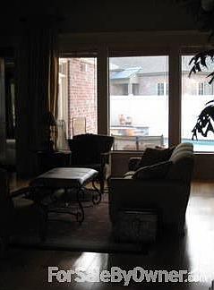 Living area and pool area
						:
						Three large windows for view and light