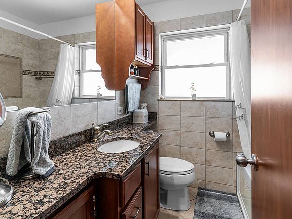 5th image of 3730 N Odell Ave