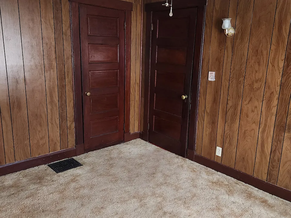 Front second floor bedroom fully carpeted.