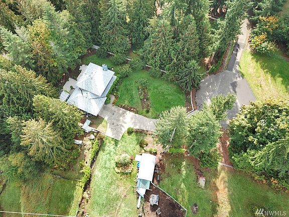 Over head View of the Property. A great Mix of Open Space & Trees for Privacy. Paved Cul De Sac Street.