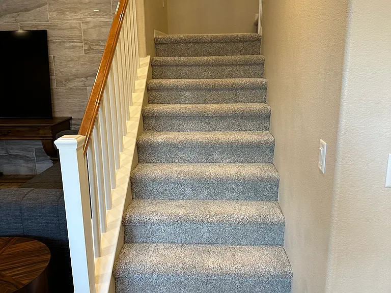 Plush stair case with new carpet