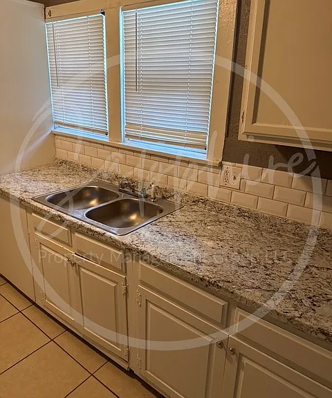 5505 Woodland Ave — Photo 6