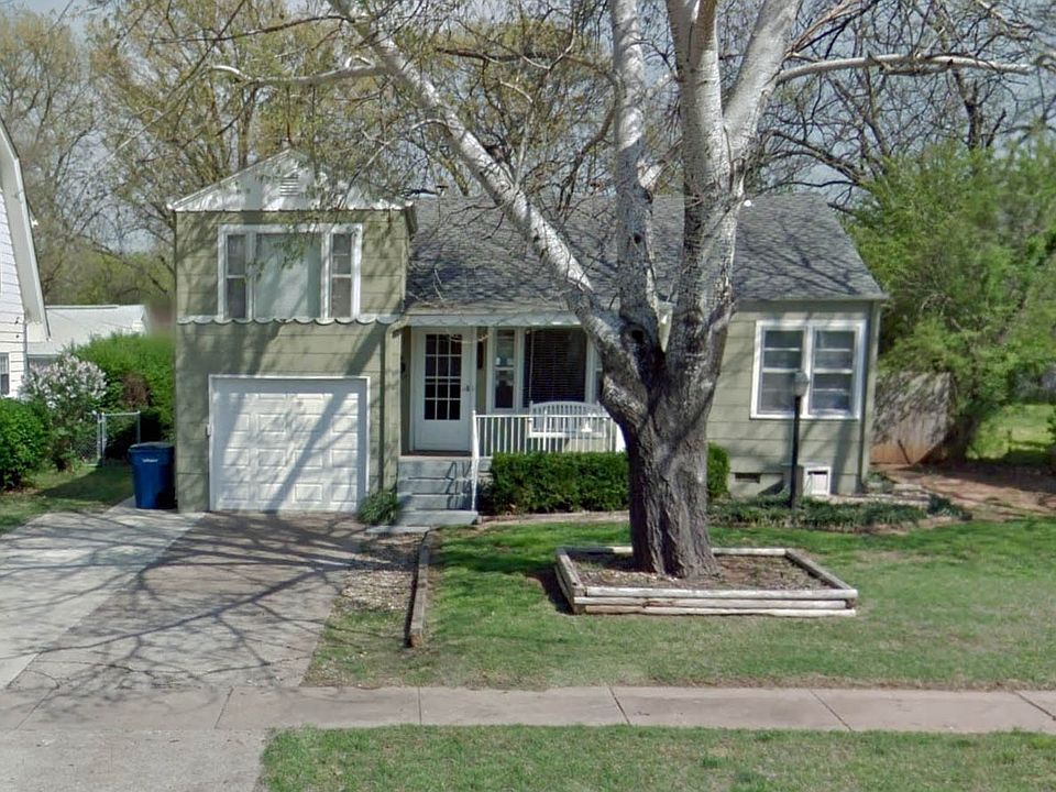 The large tree had to be removed since the picture was taken.