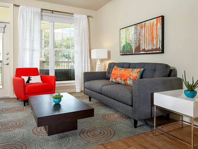 Living Room with balcony access and faux-wood flooring