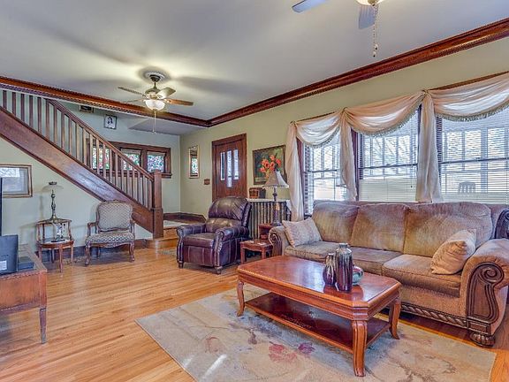 1920s charm in full tact! Exquisite millwork, traditional layout and freshly refinished hardwood floors!