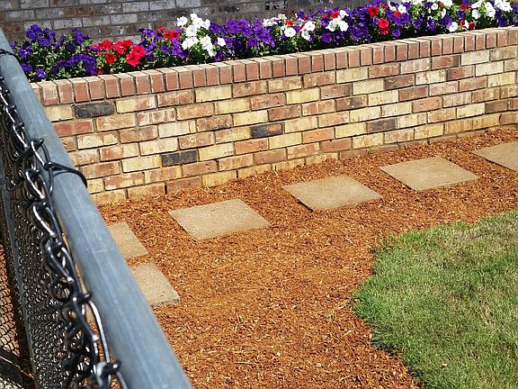 Brick planter in front