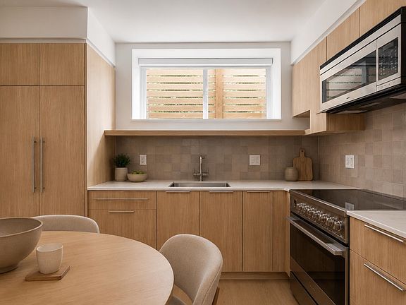 3rd image of 595 E 49th Ave #2
