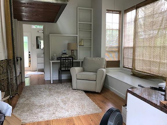 Spacious main living area with high ceilings and lots of natural light.