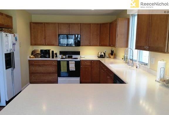 Newly Remodeled Kitchen with hardwood flooring, pantry, new ligh