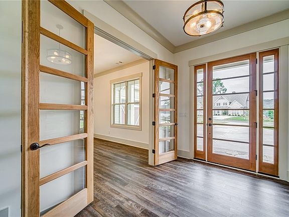 Image 5: Stunning Entry Door Allows Ample Light