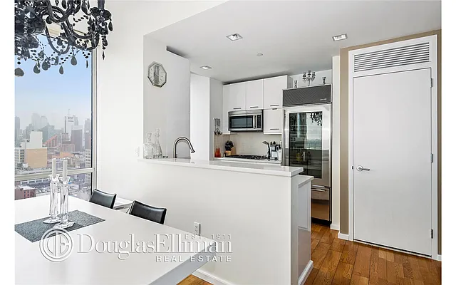 Sold by Douglas Elliman | media 6