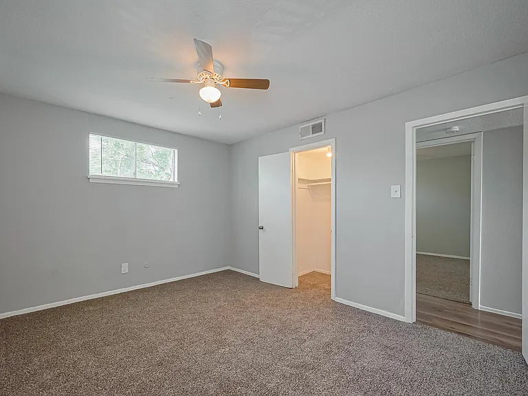 Bedroom with walk in closet