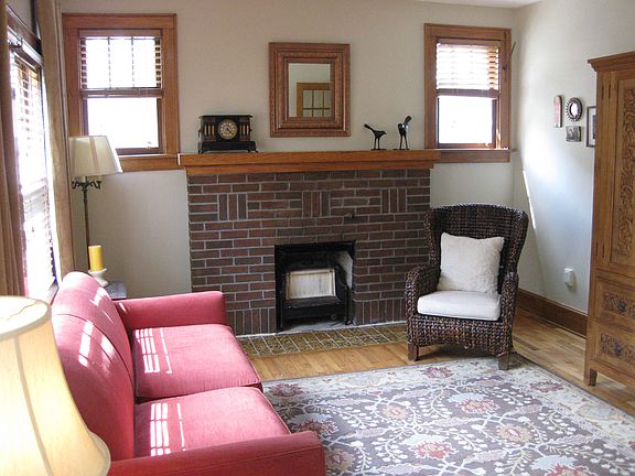 Sunny living room with gas fireplace