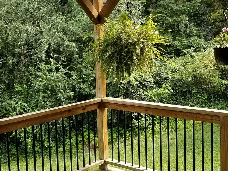 Private deck with wooded view