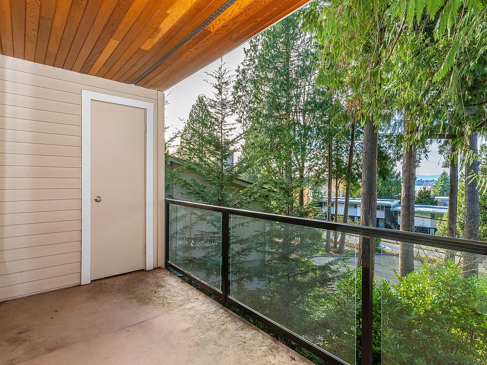 Enjoy the covered deck with a peek-a-boo lake view!
