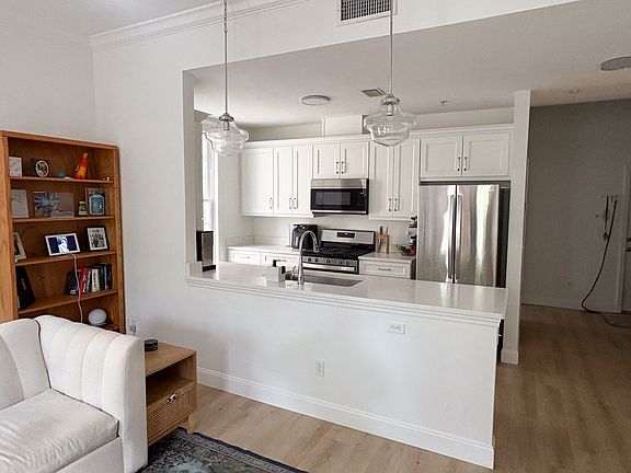 View of great room into the all remodeled kitchen.