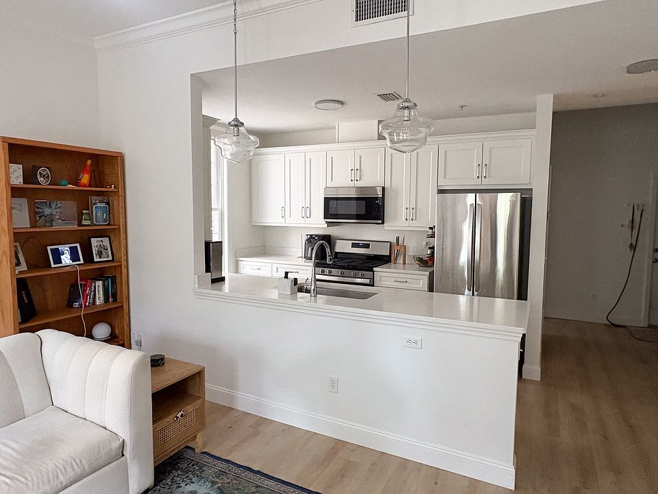 View of great room into the all remodeled kitchen.