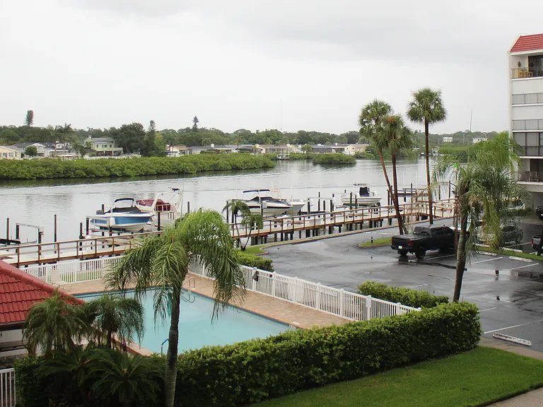 Living Room Balcony View to Pool and Intercoastal