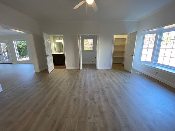 Large family room with bay window and half bath.