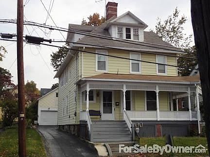 Front & Garage in rear
						:
						this porch wraps around to a side door and steps that lead to the rear yard