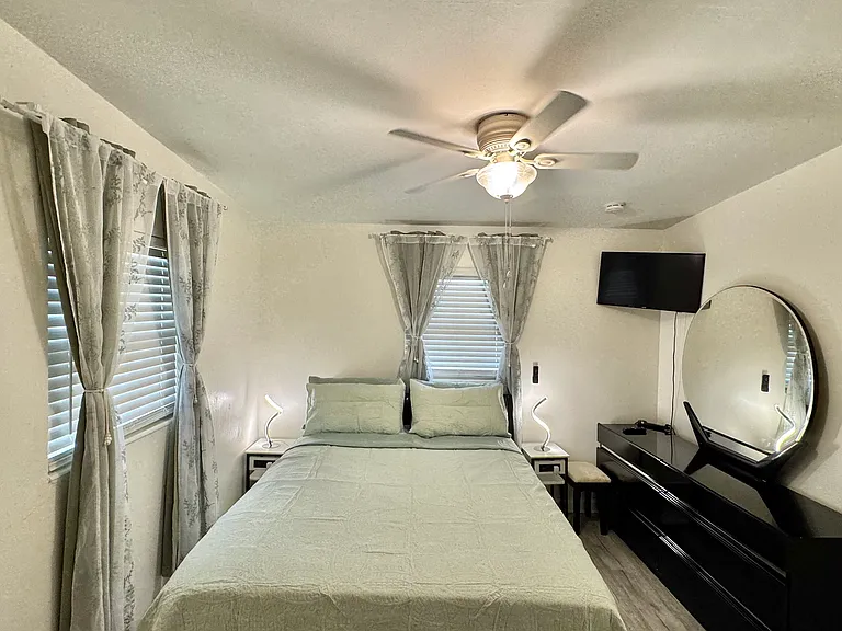 Spacious Primary Bedroom with TV