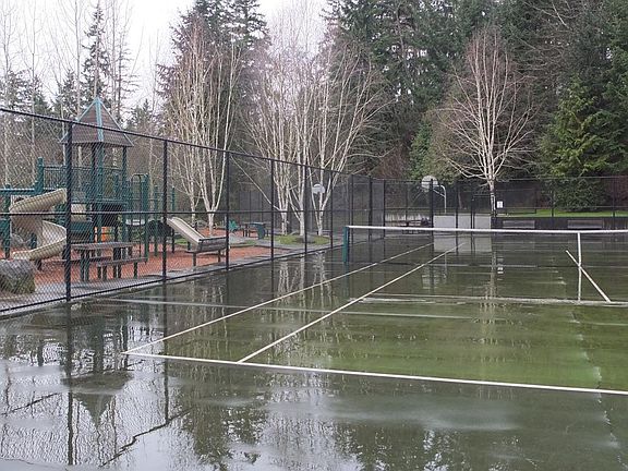Park across from house tennis and basketball court