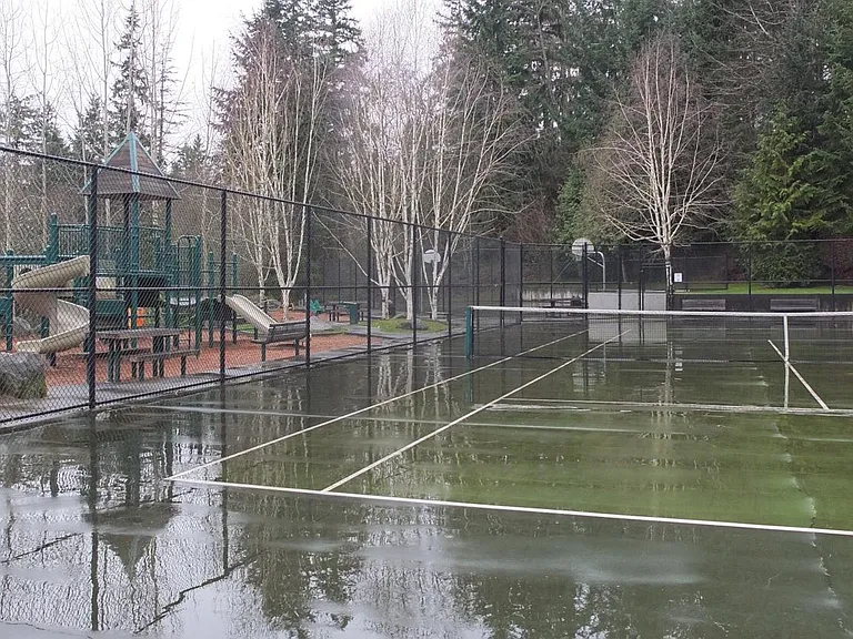 Park across from house tennis and basketball court