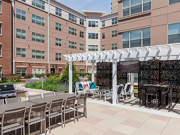 Entertain at the outdoor lounge complete with TVs, grilling station and dining areas