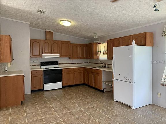 5th image of 3855 NE Bonanza Park Ave