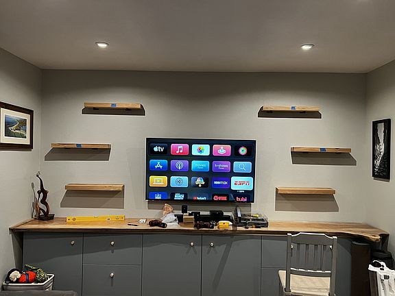 Living room built-in cabinets and floating shelves
