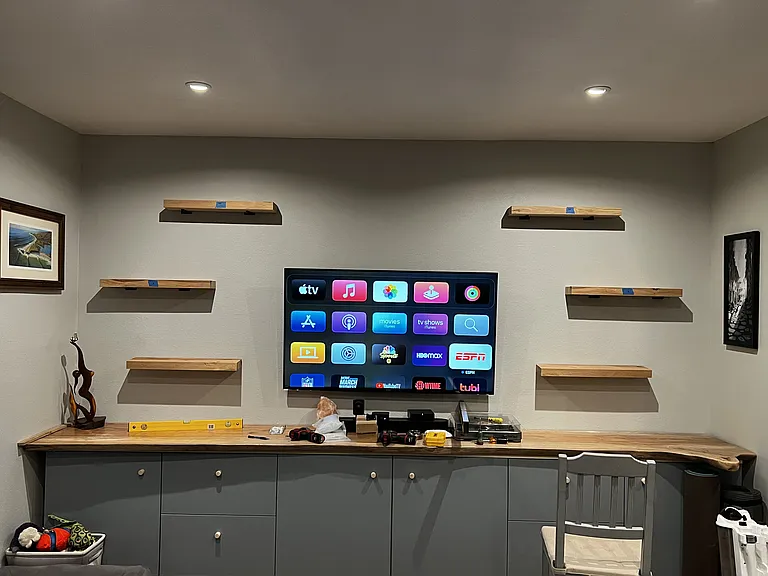 Living room built-in cabinets and floating shelves
