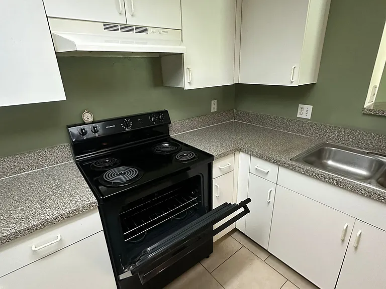 5005 Wiles Rd — Photo 34