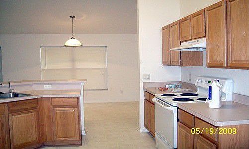 Nice wood cabinet w/breakfast bar