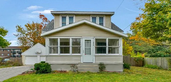 Front of house and sunroom