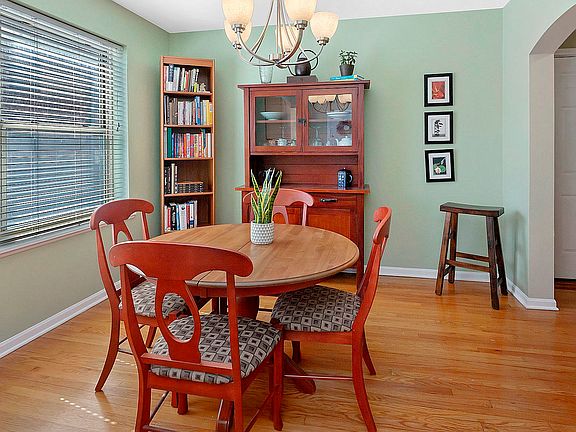 The dining room area easily fits a table for 6-8, perfect for hosting dinner parties and holiday gat
