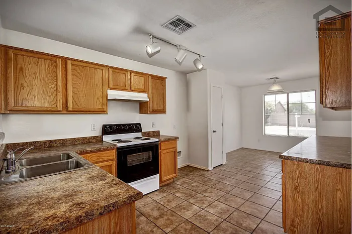 7407 S Sunrise Way — Photo 6