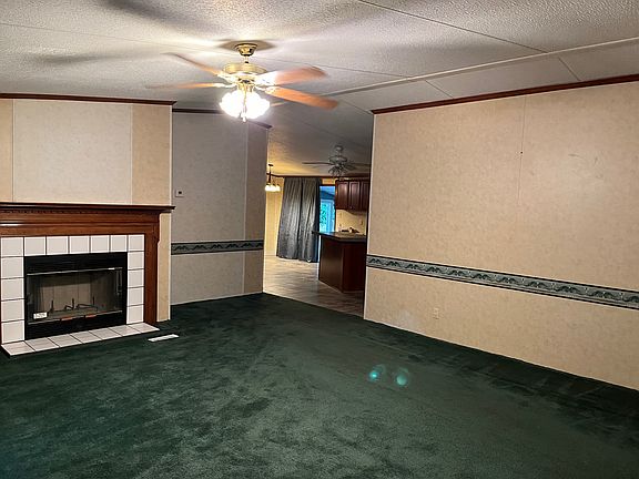 Entry into the front living room from the front door and leads in to the Master Bedroom and the kitchen!