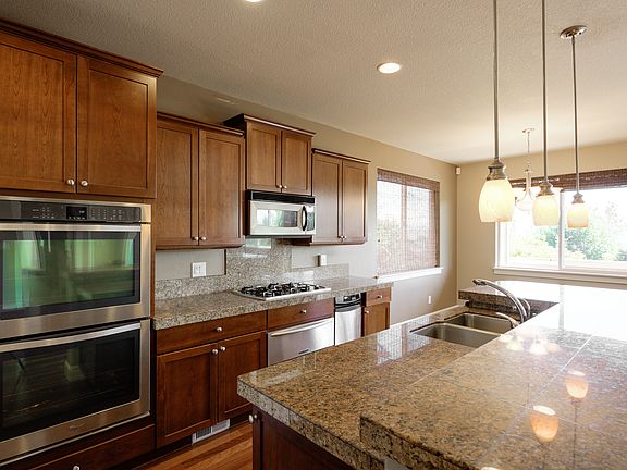 all granite & ss w dbl oven