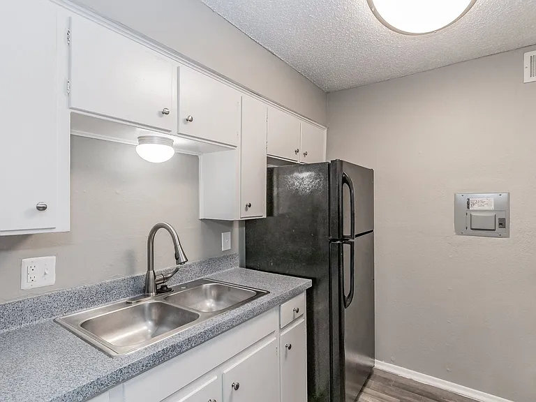 Modern kitchen featuring gas stove and ample counter space