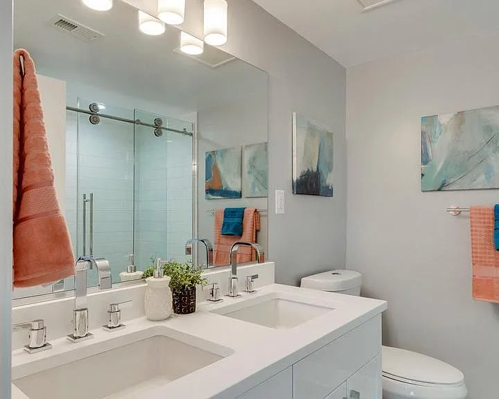Bathroom with glass shower and updated vanity