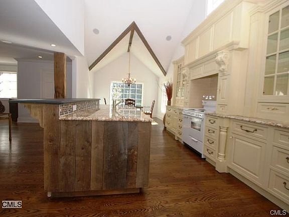 Vaulted ceiling in the kitchen brings in so much natural light