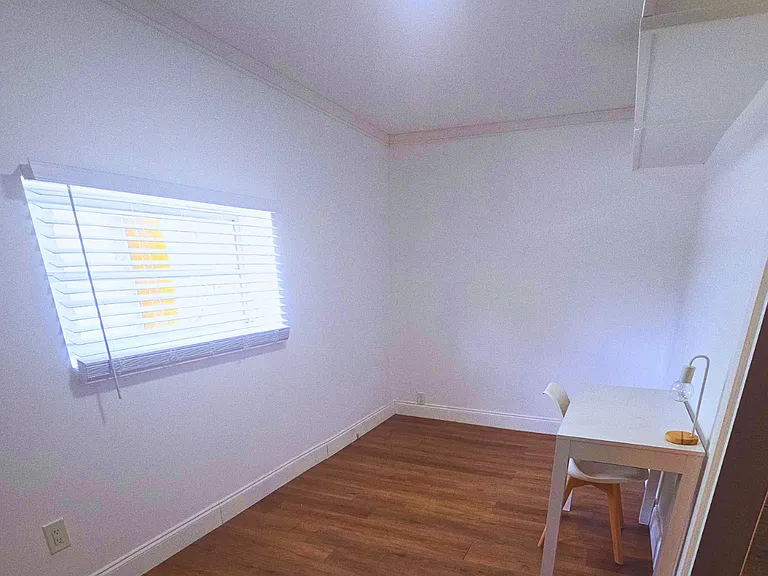 Dedicated workspace with two desks and chairs for work or study.