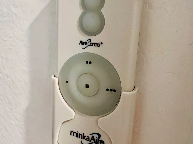 There are three ceiling fans in the unit with special controls for the lights and fan speeds