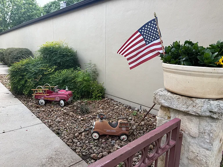 PATRIOTIC SIDE YARD TO BE LANDSCAPED.