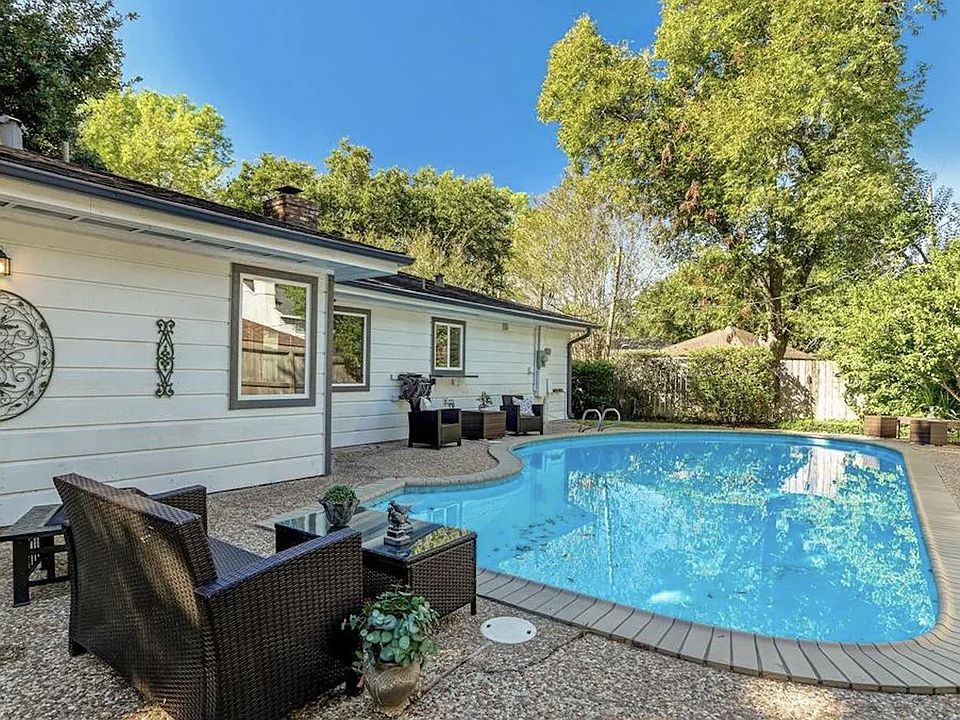 Cool of from the Texas heat in your private oasis! If you look closely, you'll see the Kitchen window has a serving bar!