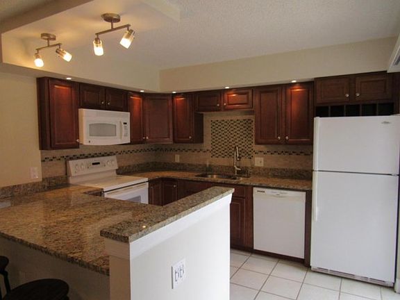 4th image of 3227 Gardens East Dr APT D