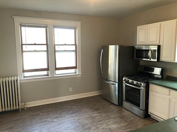 Huge kitchen with great windows .Ample counter space, new floors, new paint, lots of room to settle in.