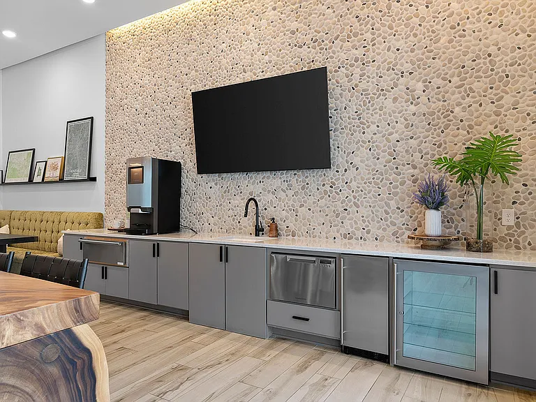 Experience elegance in this chic kitchenette, designed for urban sophistication.