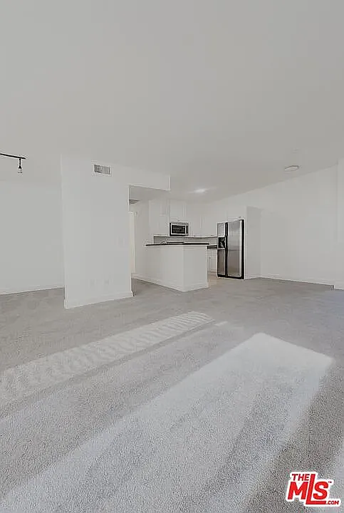 Building Photo - 13941 Sherman Way #305